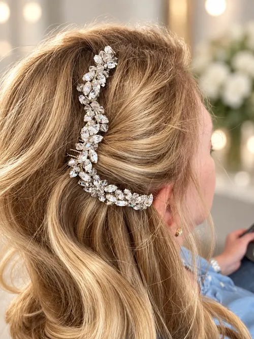 Crystal hair vine on soft blonde waves