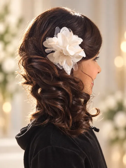 Cascading curls with silk flower